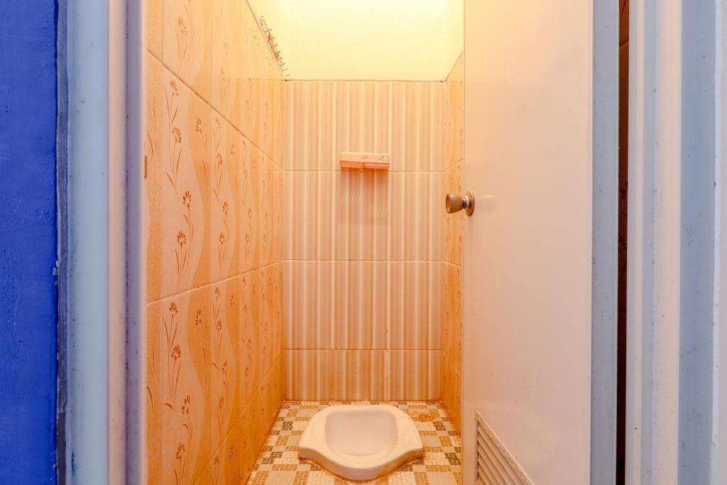 Pinky Guest House Syariah Kota Batu Buitenkant foto